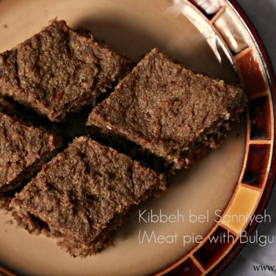 Meat pie with Bulgur (Kibbeh bel Sannieyh)