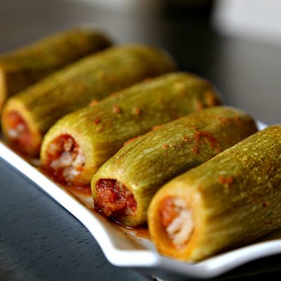 Stuffed White Zucchini in Tomato Sauce (Kousa Mahshi)